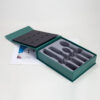 Scatola rigida magnetica personalizzata di forma irregolare, color verde, con inserto in schiuma