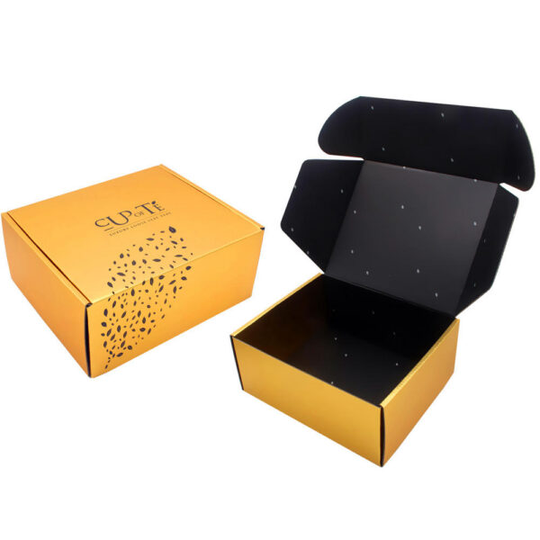 Caja de regalo para té «Gold Mailer» con interior estampado con hojas negras