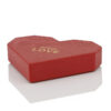 Textured Red Heart-Shaped Rigid Box with Gold Foil Logo Textured Red Heart-Shaped Rigid Box with Gold Foil Logo