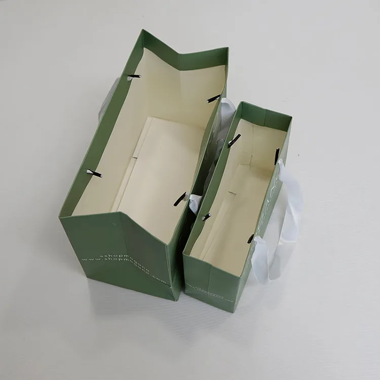 Luxury paper shopping bags with custom printed logos