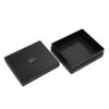 Black two-piece rigid gift boxes shown open and closed with gold foil logos