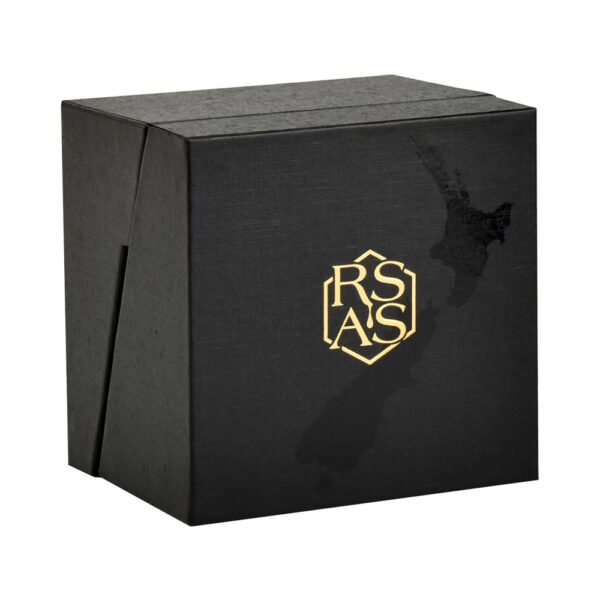 Closed angled facial serum ampoule gift box with black textured wrap and gold foil details