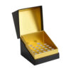 Open black hinged serum ampoule gift box with gold multi-well insert and glass ampoules