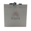 Ivory Paper Shopping Bag with Black Ribbon Bow and Gold Logo
