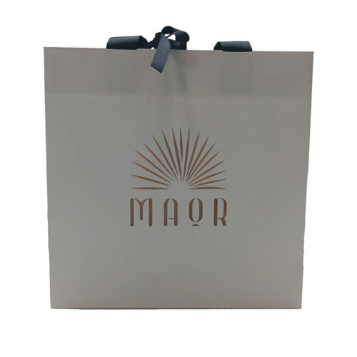 Ivory Paper Shopping Bag with Black Ribbon Bow and Gold Logo