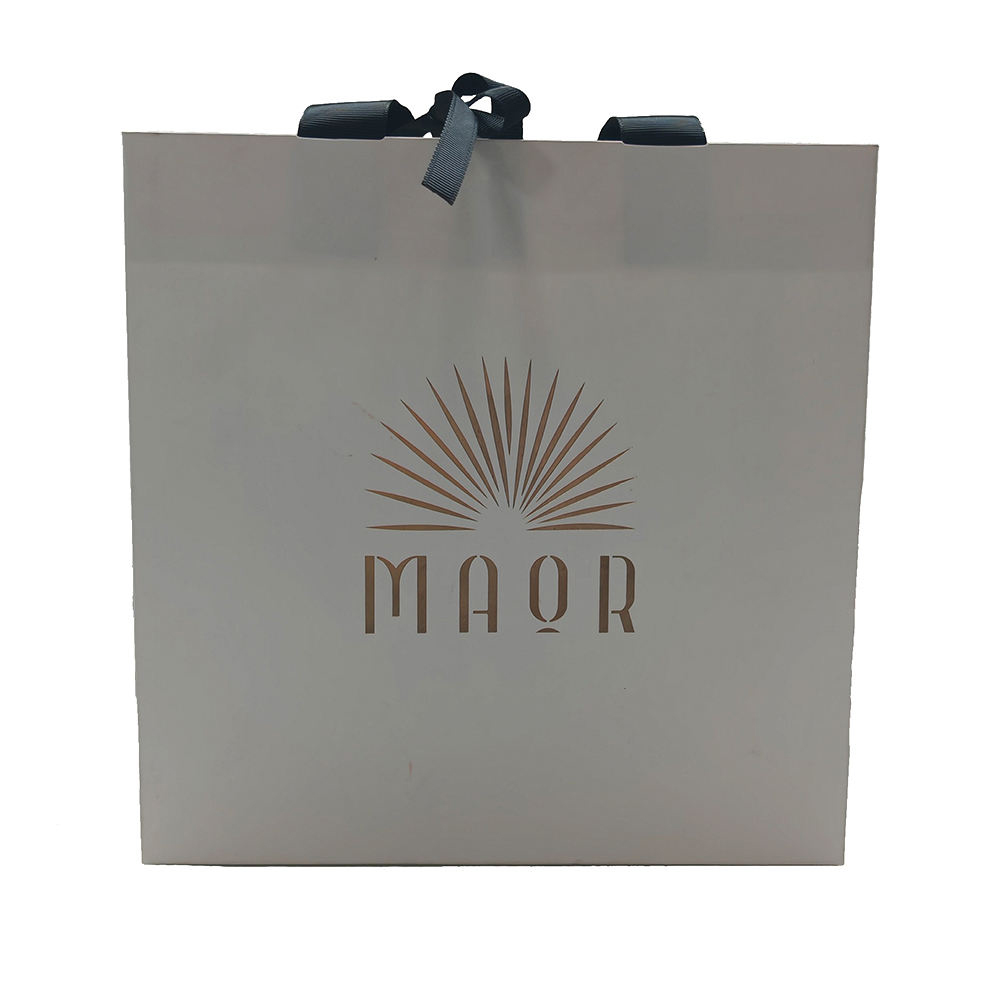 Ivory Paper Shopping Bag with Black Ribbon Bow and Gold Logo
