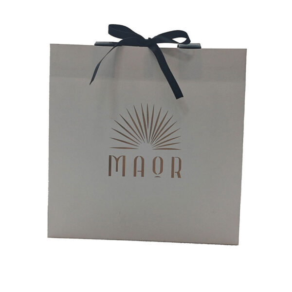 Ivory Paper Shopping Bag with Black Ribbon Bow and Gold Logo