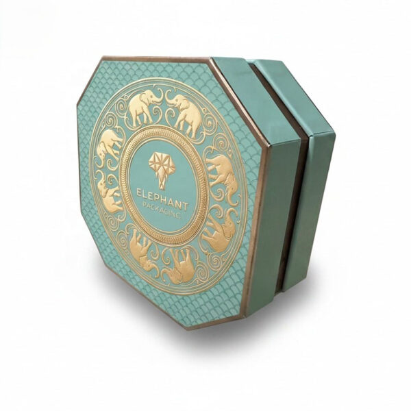 Tealkleurige achthoekige chocoladegeschenkdoos met goudkleurige binnenvoering